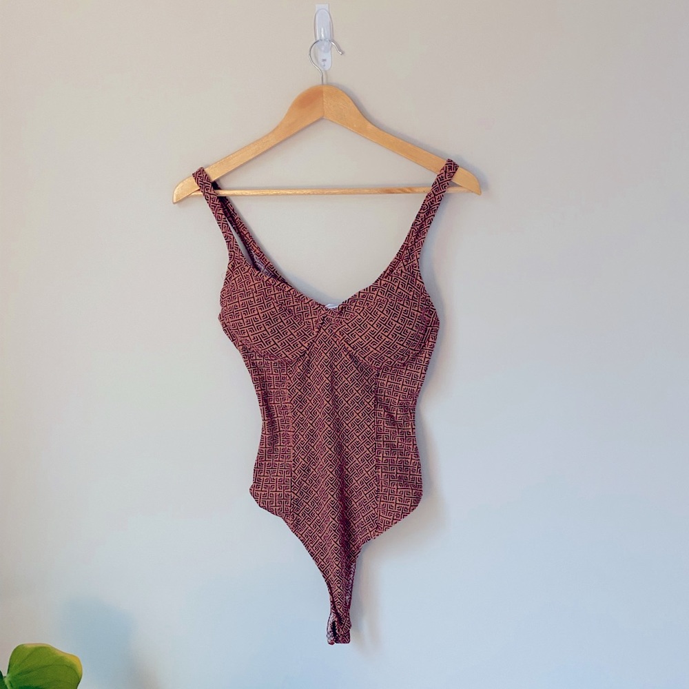 Vernacular bodysuit